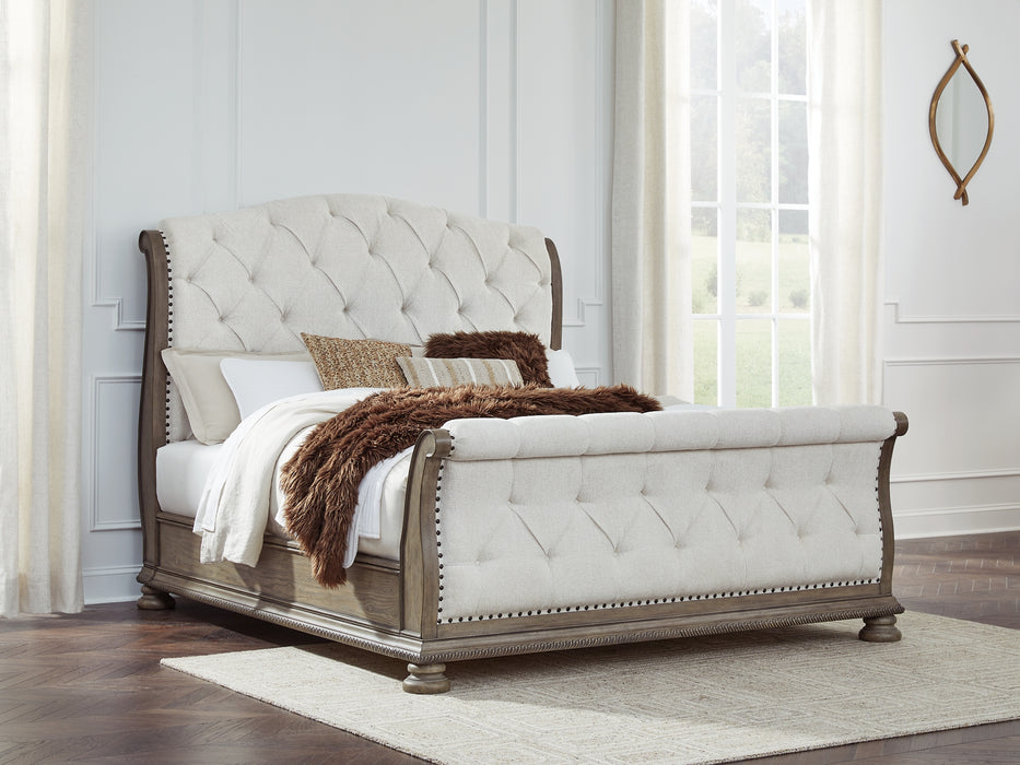 Ardenfield King Upholstered Sleigh Bed with Mirrored Dresser and Nightstand