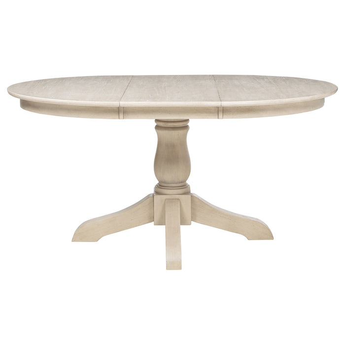 Orrison Oval 62-inch Wood Extension Leaf Dining Table Linen