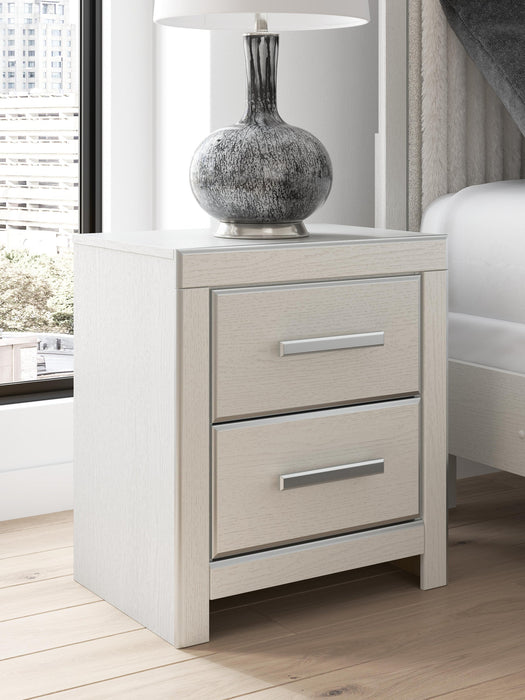 Zuraleus King Upholstered Bed, Dresser, Mirror, Chest and Nightstand